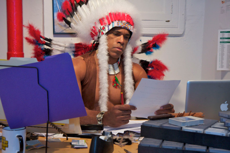 Arizona State’s Navajo tracker briefly scans a list of outstanding library fines before setting off to trail a graduate.